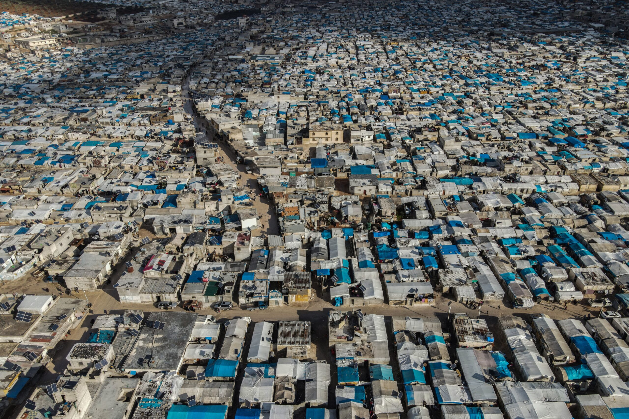 Aerial view of rows of tents at refugee camp